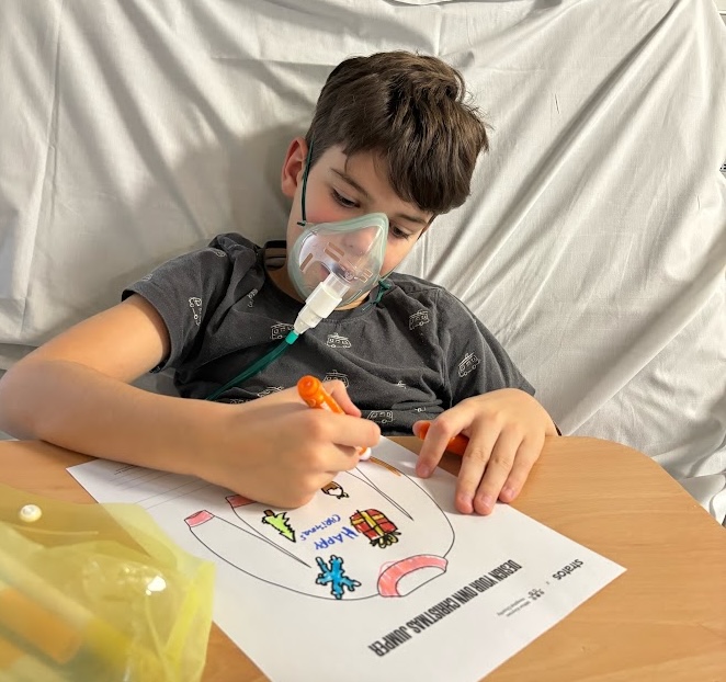 child in hospital bed