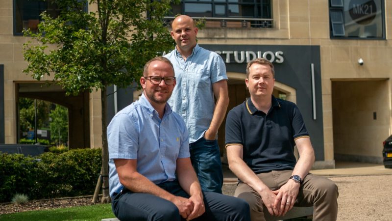 Martin, Marc and Darren sitting in front of Witan Studios